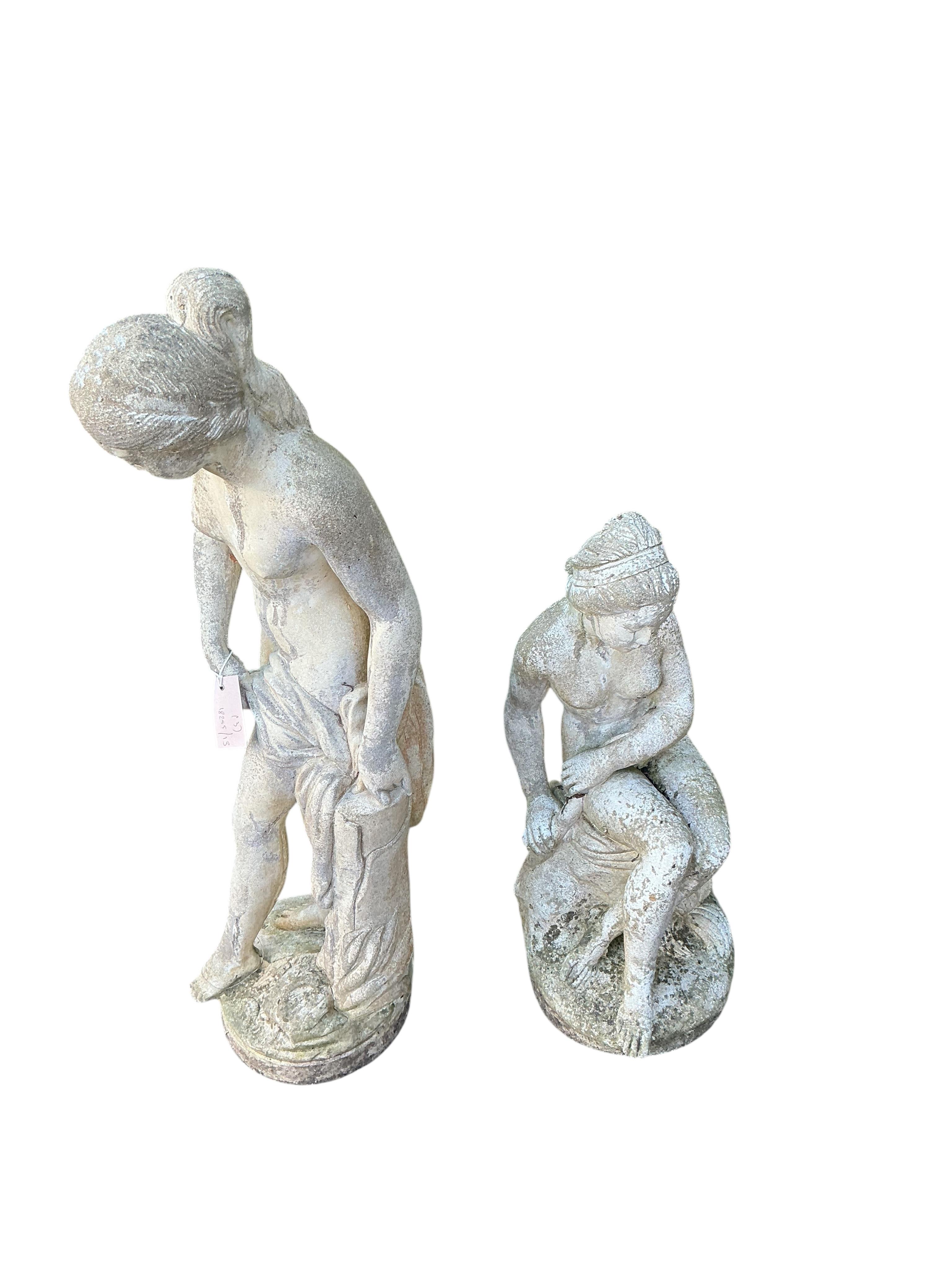 Three reconstituted stone garden ornaments, largest height 82cm